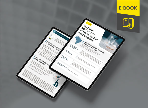 Mockup ilustrativo de dois tablets, um acima do outro, com imagens do conteúdo interno do e-book. No canto superior direito, faixa descritiva nas cores amarelo e cinza, com o nome "e-book" escrito