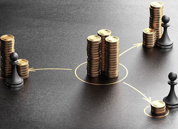 Illustrative image of stacks of coins with chess pieces next to them