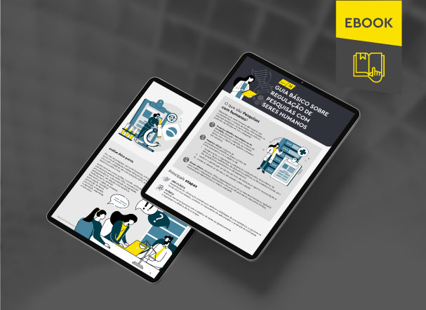 Mockup ilustrativo de dois tablets, um acima do outro, com imagens do conteúdo interno do e-book. No canto superior direito, faixa descritiva nas cores amarelo e cinza, com o nome "e-book" escrito